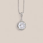 14k white gold-plated Prosperity necklace featuring a cushion-cut cubic zirconia crystal encircled by smaller accent crystals.